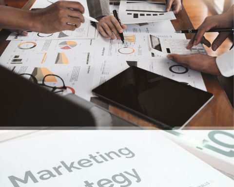 Startup founder reviewing digital marketing performance dashboard on laptop, planning scalable growth strategy using data-driven insights